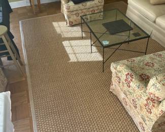 Many matching Natural Fiber Rugs of varying sizes throughout the home