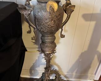 This is a large polished bronze floor vase from the Japanese Meiji period. 