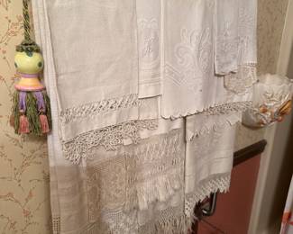 Assortment of beautiful Antique towels, more throughout the house