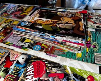 Stack of comics not pictured laid out