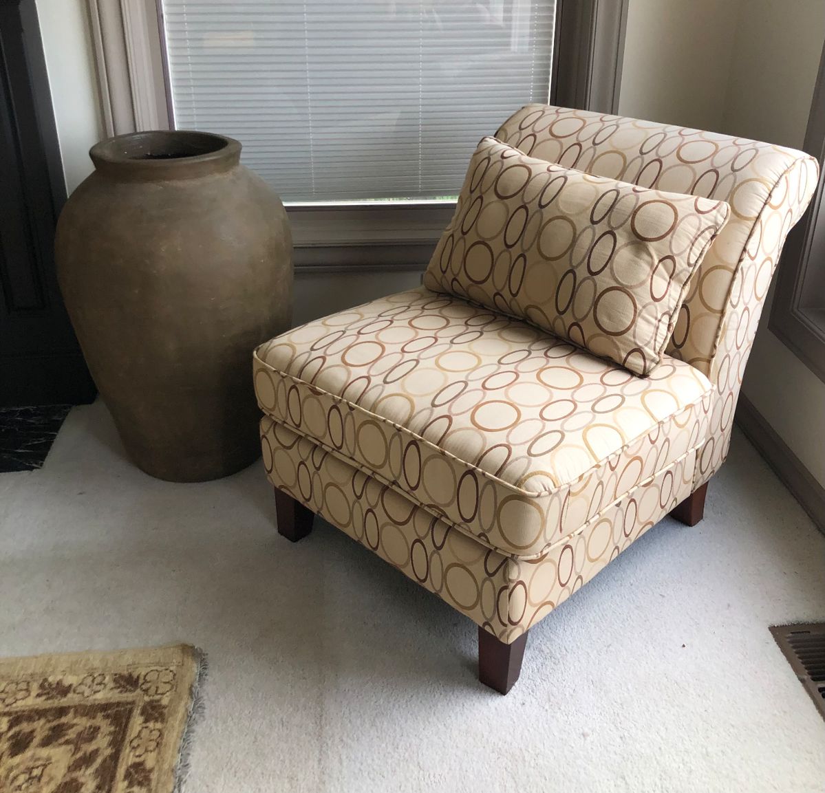 Slipper chair with curved back + pillow (30”W, 32” high at back), Crate + Barrel big ceramic pot/vase (30” tall)