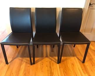 3 BoConcept leather dining chairs - very dark brown (Denmark) - one has tears at seat edges