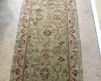 Hand woven wool area rug (30” x 64”)