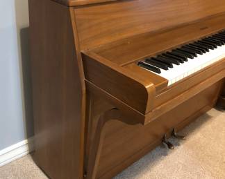 Side view of piano - clean modern lines