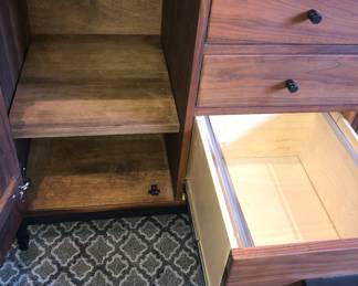 Interior of Room & Board cabinet - interior shelves are adjustable & 2 bottom center drawers can hold letter or legal size files