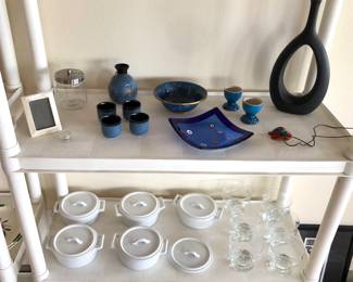 Blue ceramic sake set, cloisonne bowl, square blue art glass dish, Le Creuset egg cups, black hole vase; Crate + Barrel 6” white covered casseroles
