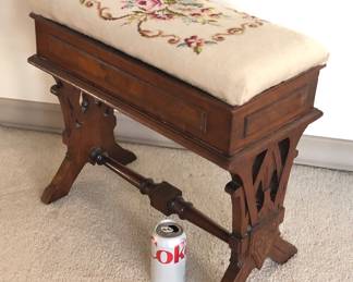 Antique Eastlake piano (organ?) bench with needlepoint seat - top is hinged with storage inside (21”L, 19”H, 11”D)