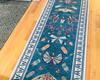 Ruggables “Flutterby” washable runner + pad (2.5 x 12 ft. long) Designed by Iris Apfel