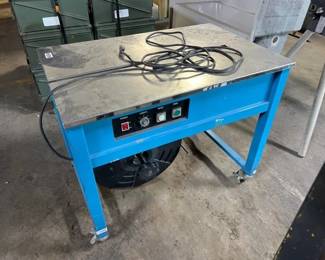 SEMI AUTOMATIC TABLE STRAPPING MACHINE