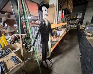 SKELTON MAN AND JOHN DEERE WINDMILL