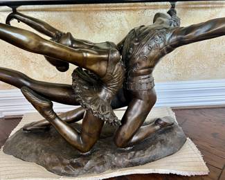 LARGE BRONZE BALLET BEVELED GLASS TOP TABLE.  SIMPLY OUTSTANDING!