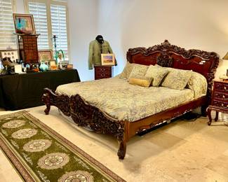 MASTER BEDROOM WITH KING BED ADJUSTABLE MATTRESS.  HEAVILY CARVED.