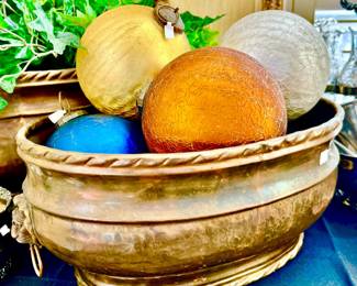 WE HAVE MULTIPLE BRASS PLANTERS RANGING IN SIZE WITH LION HANDLES.