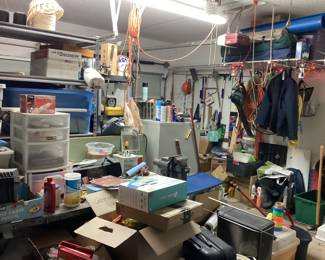 Tools shop lights, electrical cords, overhead storage shop bench