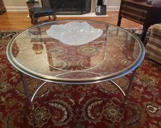 Round glass top coffee table. 