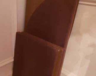 The dining table includes protective pads