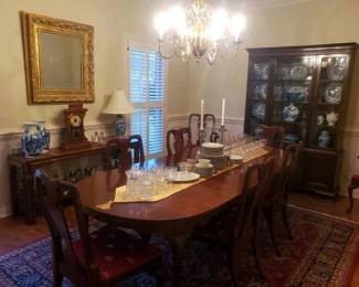 Long beautifu dining table with eight dining chairs
