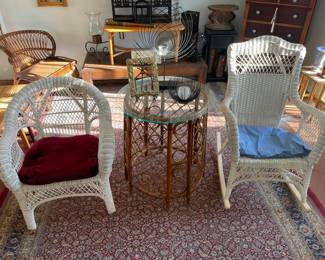 Sunroom full of vintage bamboo and wicker furniture