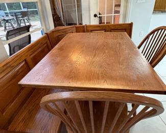 $375 Oak table w/2 chairs and L shaped storage bench (measurements are 52" x 36" x 30")