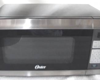 7687 - Oster Microwave – 1	8" x 12" x 10" You are buying a used as-is electric/electronic item. We do not guarantee all components are present, and if it is not expressly stated, it is untested.

