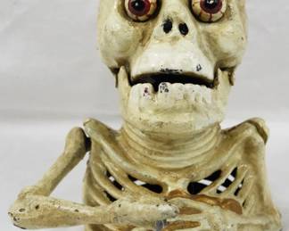 1457 - Cast Iron Skeleton Bank 6.5"
