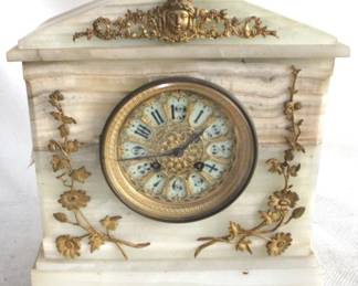 7927 - Marble Mantle Clock - 11 x 12.5 x 6 You are buying a used as-is electric/electronic item. We do not guarantee all components are present, and if it is not expressly stated, it is untested.

