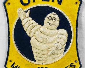 1464 - Cast Iron Michelin Man Sign 11x9
