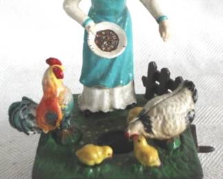 7865 - Cast Iron Woman w/ Chickens Bank - 10x5x5
