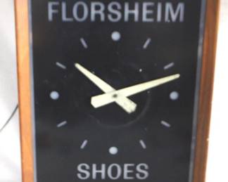 7790 - Florsheim Shoes Advertising Clock 16.5" x 21" You are buying a used as-is electric/electronic item. We do not guarantee all components are present, and if it is not expressly stated, it is untested.