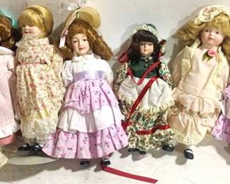 3335 - 8 Porcelain Dolls - 9" tall
