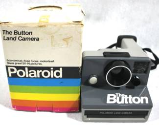 5027 - Polaroid "The Button" Camera w/ Box You are buying a used as-is electric/electronic item. We do not guarantee all components are present, and if it is not expressly stated, it is untested.
