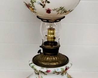 Antique cherub milk glass lamp