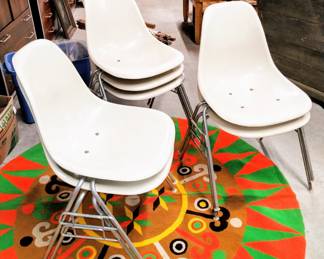 M.C.M. Herman Miller white chairs