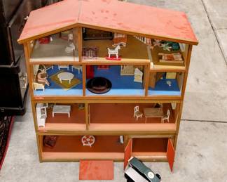 Vintage dollhouse with furniture and more