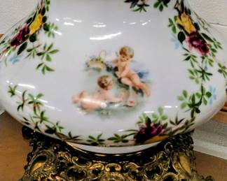 Antique cherub milk glass lamp