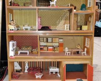 Vintage dollhouse with furniture and more