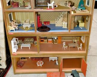 Vintage dollhouse with furniture and more