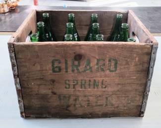 Vintage Girard Spring water bottles in wooden crate