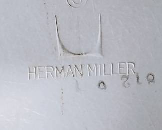 M.C.M. Herman Miller white chairs