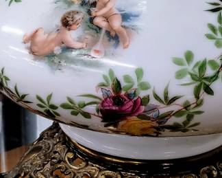 Antique cherub milk glass lamp