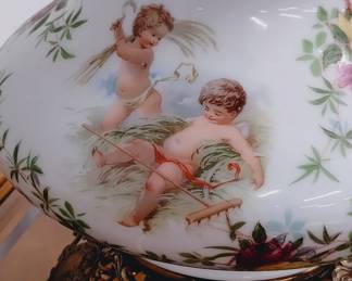 Antique cherub milk glass lamp