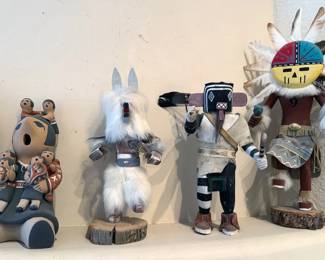 Assorted kachinas, including wolf + sun god
