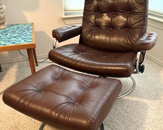 Armchair with footrest