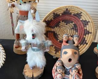 Assorted Native American artwork: kachinas, ceremonial basket, Storyteller doll by Judy Toya (Jemez)