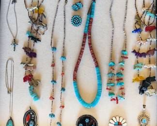 Native American jewelry, including Zuni fetish necklaces.