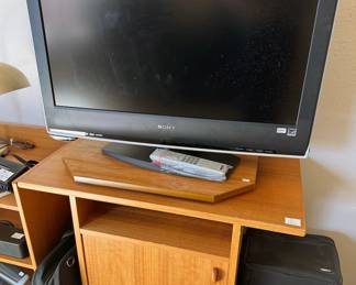 Sony TV, wood console
