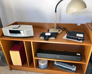 Teak veneer entertainment stand, Bose Wave radio + soundbar, vintage Sony WM-D6C portable cassette recorder