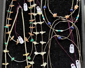 Native American necklaces, including Zuni fetishes