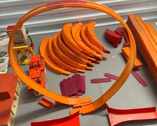 Many parts of the Hot Wheels 1967 Stunt Action Set s with 2 Hot Wheels 2 Way Super Chargers
