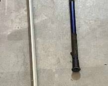 Two Lacrosse sticks a STX al6000 pro defensive stick and a 40 blue offensive stick